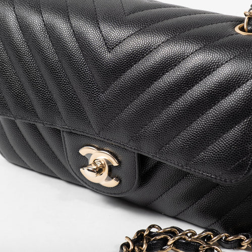 Chanel Classic Mini Rectangular Flap Bag in Black Chevron Caviar Gold Hardware