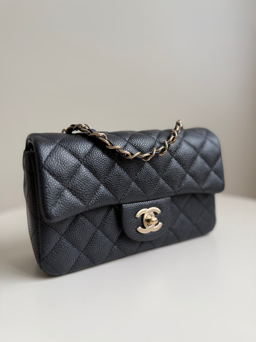 Chanel Mini Rectangular Flap in Black Caviar Matte Gold Hardware